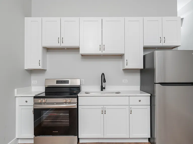 1219 W Devon Ave #201 — Photo 1
