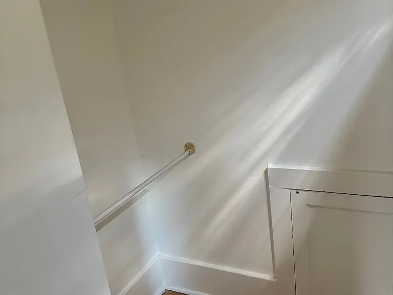 spacious walk-in closet for medium bed room
