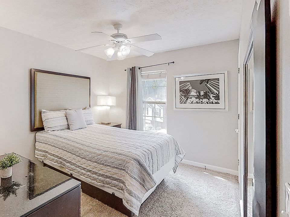 Cozy room with full bed, closet and storage area