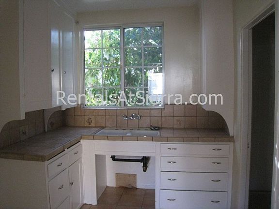 Kitchen with Tile counter tops