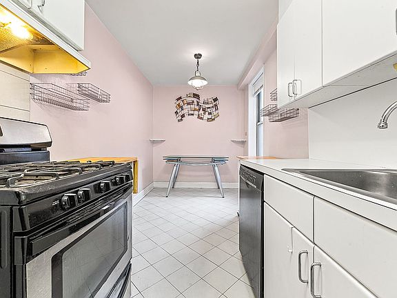 4th image of 65-65 Wetherole St #1-V