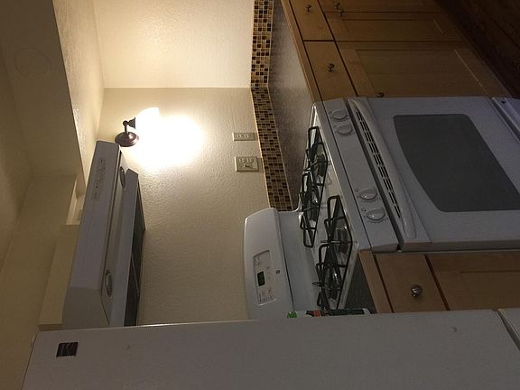 Gas range, vent hood, refrigerator