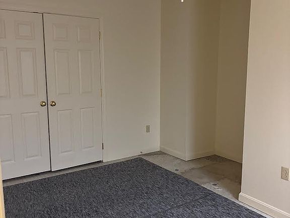 Bedroom with ceiling fan/light and large closet
