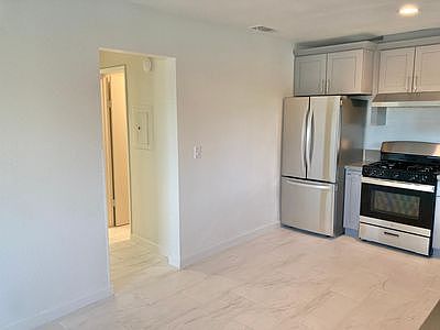 Fridge freezer and full gas range