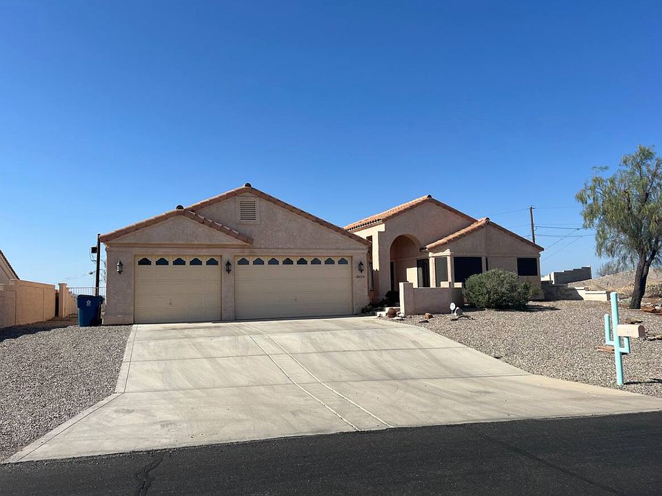 Deep garage (on left) and regular size garage on right side.
