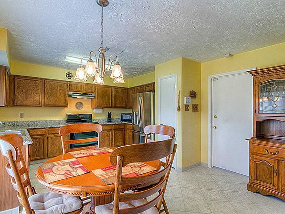 This beautiful light and bright kitchen is a great place for the family to gather.