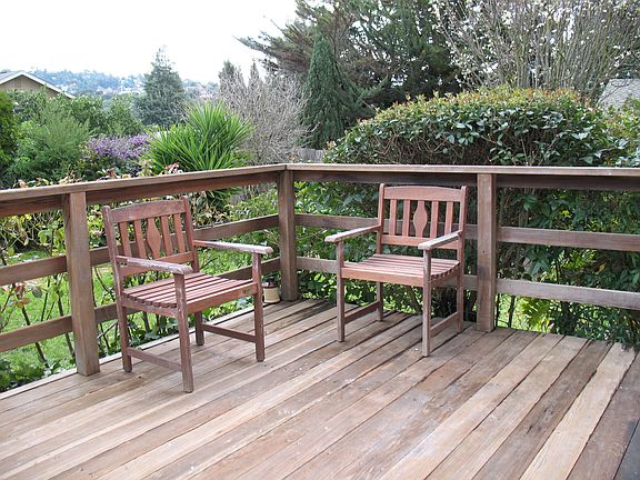 Deck Overlooking Spacious Back Yard