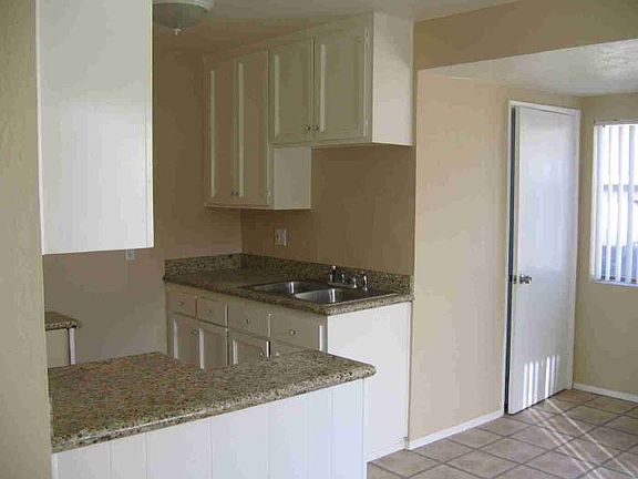 tiledKitchen/Laundry area