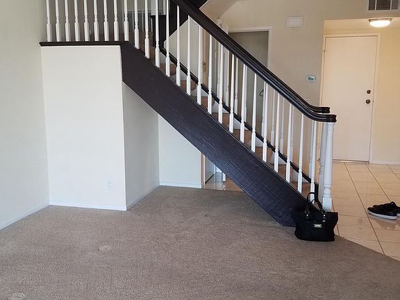 LARGE FAMILY ROOM AND STAIRS. Recessed lighting throughout