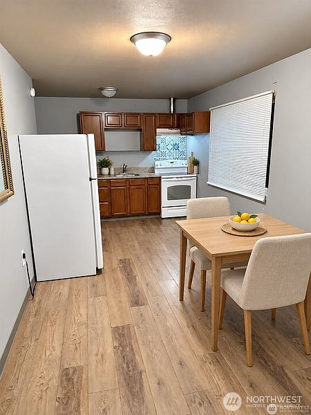 4th image of 313 N G" Street
