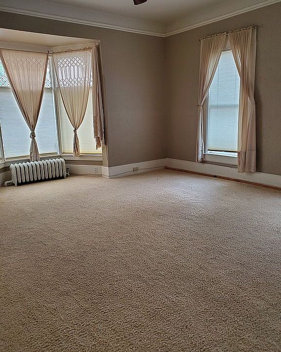 Living room w/ leaded glass bay