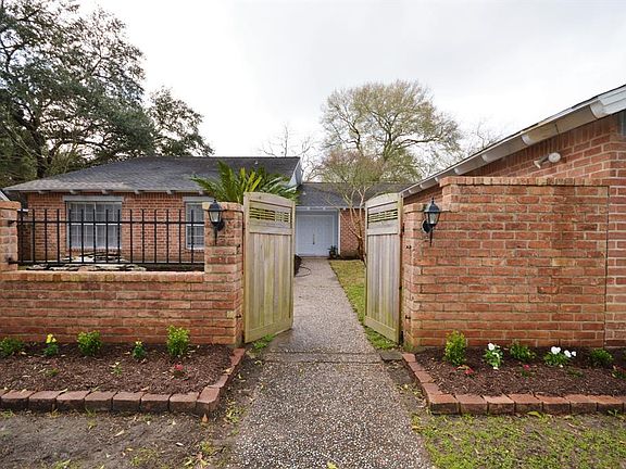 Enter to this one story home. Ones the plants start blooming it will be joy.
