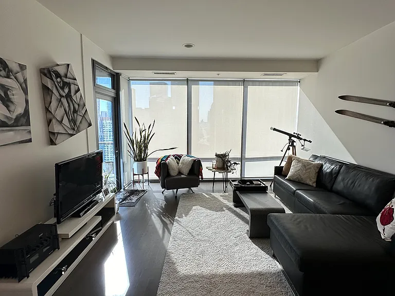 Floor to ceiling windows with custom blinds