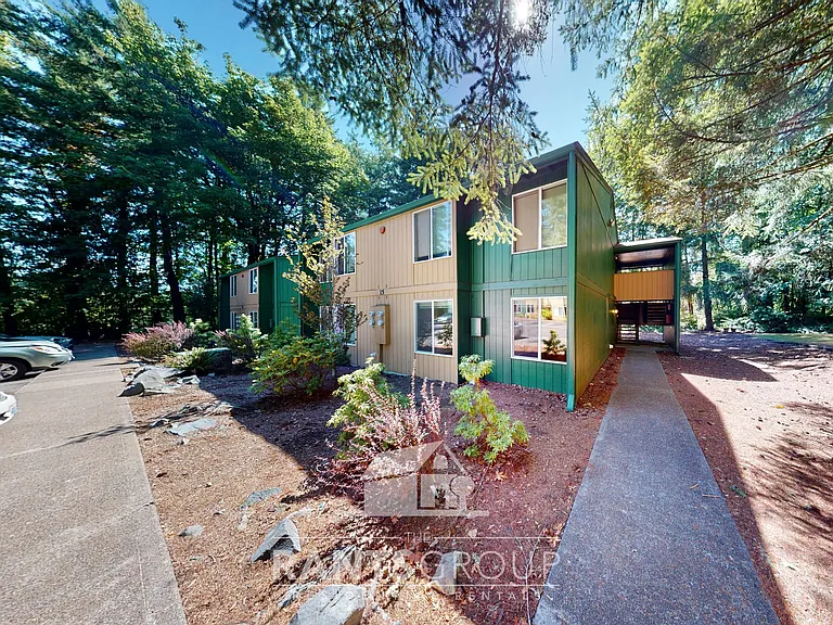 Lovely, wooded 2-bedroom apartment with a large private deck and in-unit washer & dryer! — Photo 2