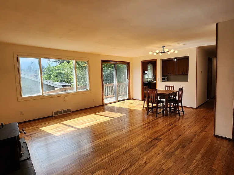 Slider off of the dining area leads to a ramp in the rear of the home to access the backyard.