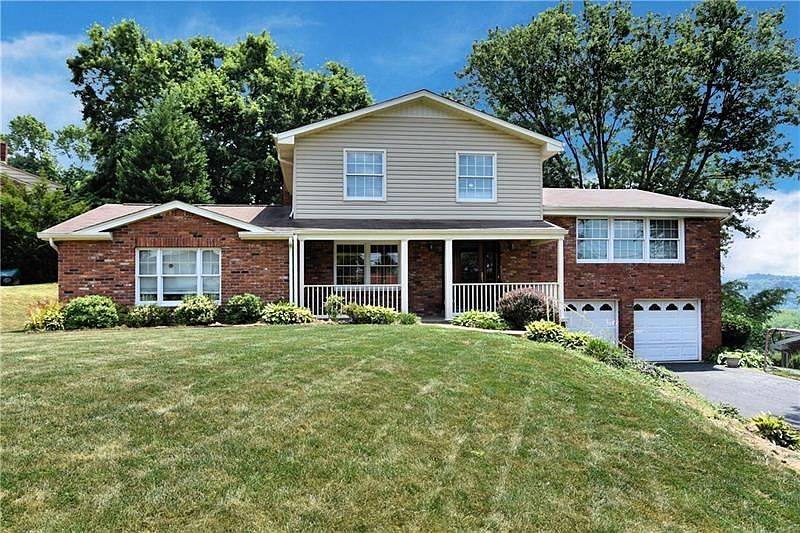 Situated on a beautiful and private lot, this home boasts four bedrooms and 2.5 baths.