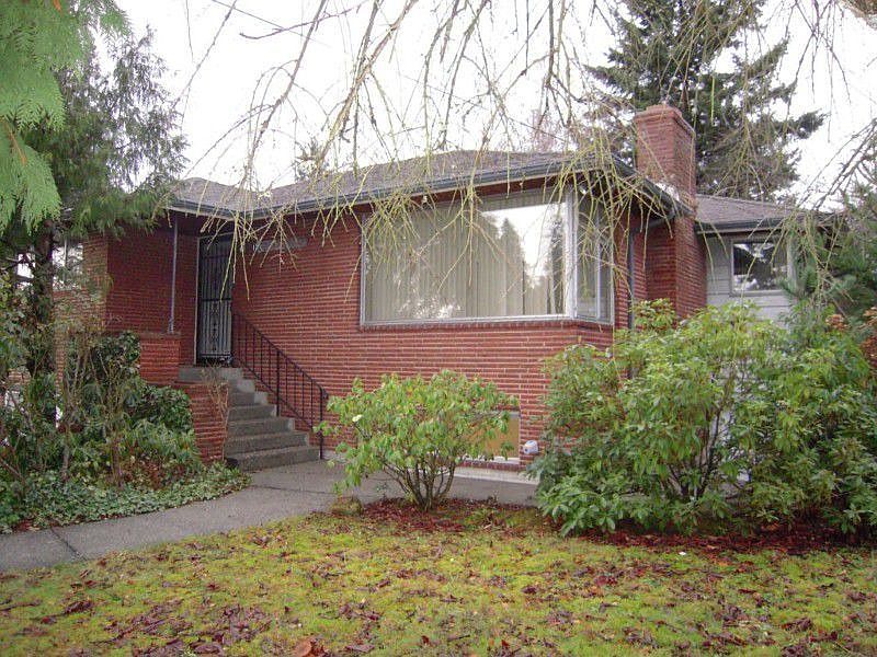 Front of home and yard