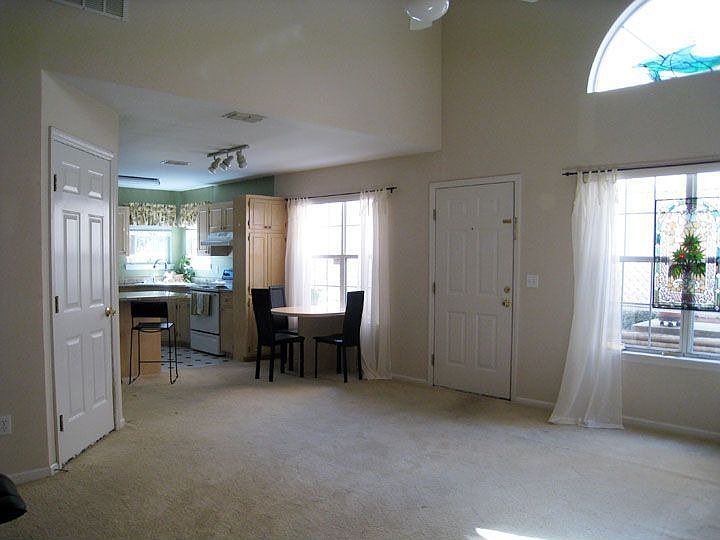 downstairs interior with vaulted ciling
