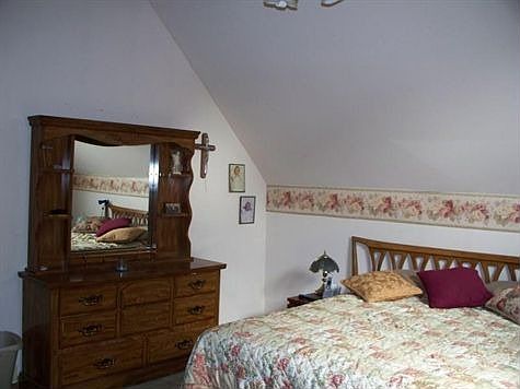 Large master bedroom with cathedral ceilings