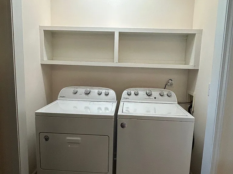 Washer and dryer included (louvered doors not shown in photo)