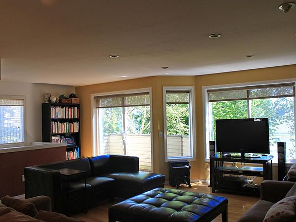 { Living Room } View from seating bar toward patio and bonus