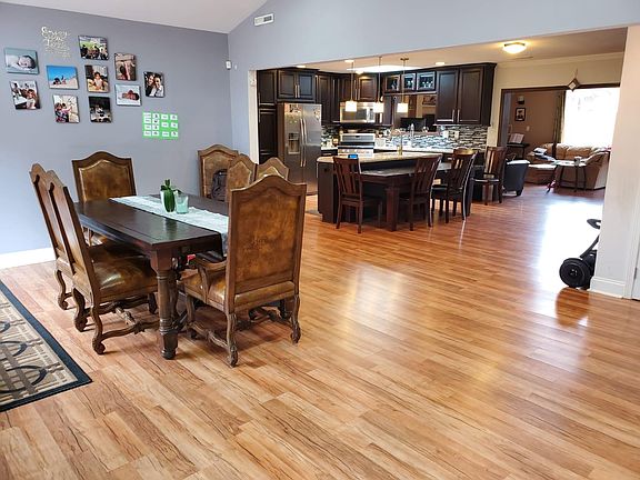 Large open kitchen and dining area, with lots of light