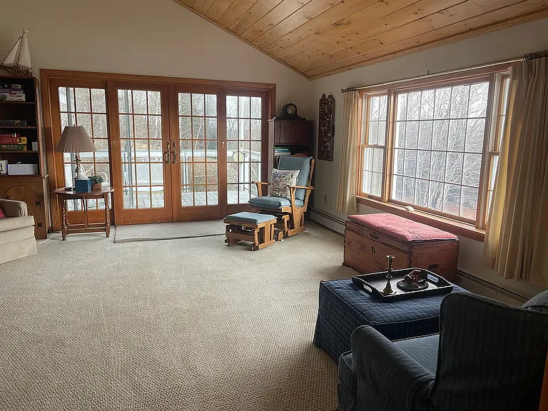 Living room with custom sliding doors to deck