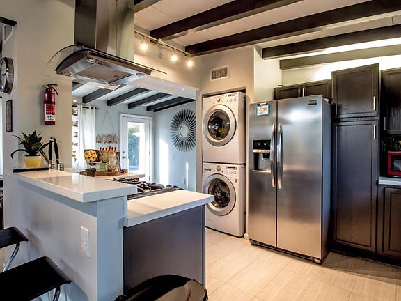Kitchen with new appliances and washer and dryer