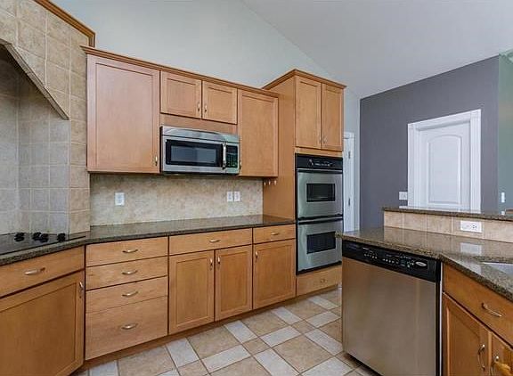Kitchen with Double Oven and Stainless Steel Appliances