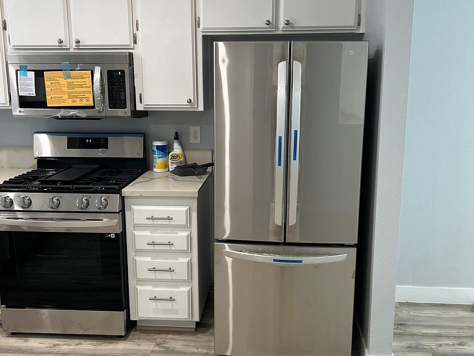 New appliances and kitchen cabinets