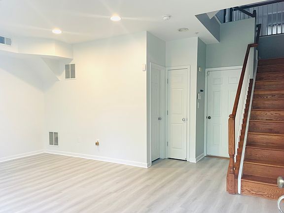 First floor living/office or gym space, access to garage, 2 large closets. Brand New Flooring put in