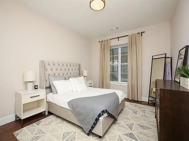 Bright and Spacious Bedroom with Over Sized Windows