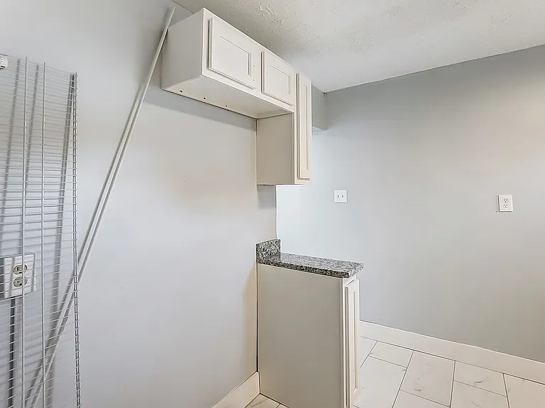 2826 E 2nd St — Photo 9
