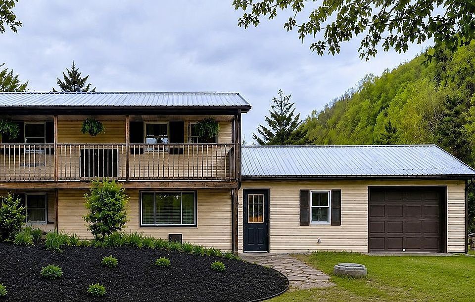 Two Levels and 2 Bay Garage 