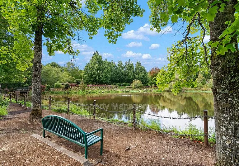 10247 NW Village Heights Dr — Photo 48