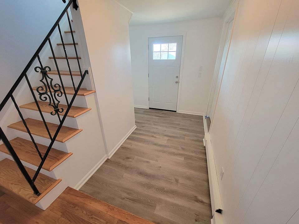 Entryway. If you enter through the back door there are no stairs to walk up.