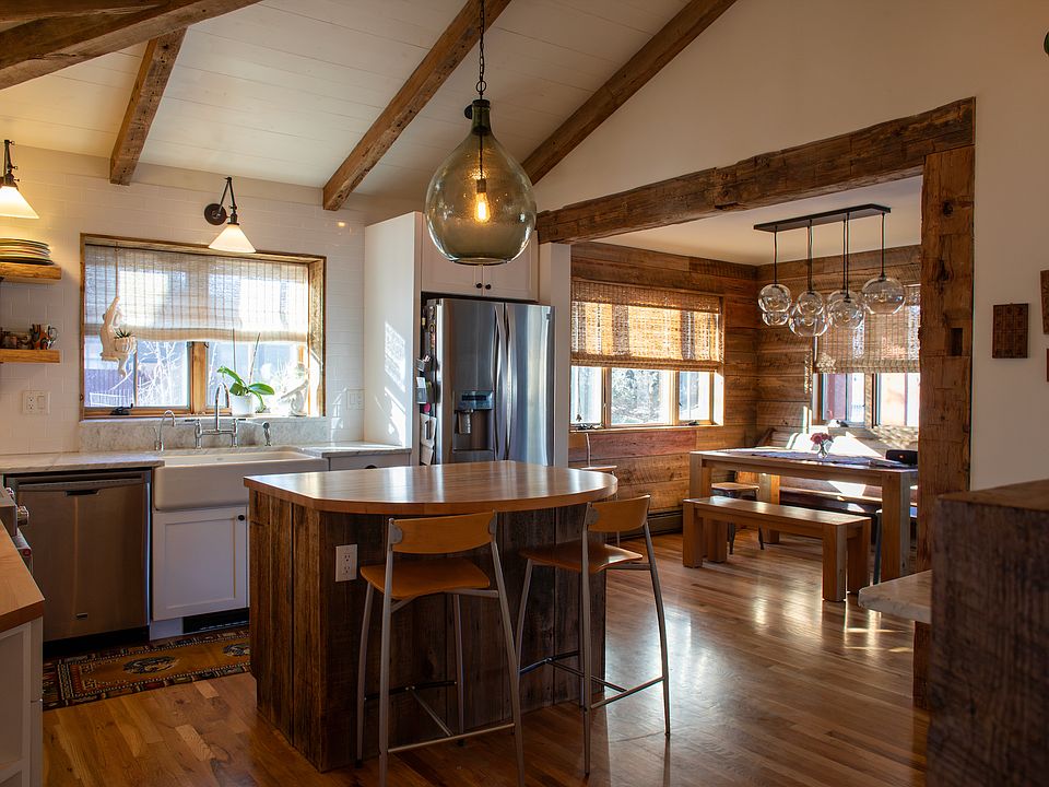 Kitchen and dining area with updated appliances