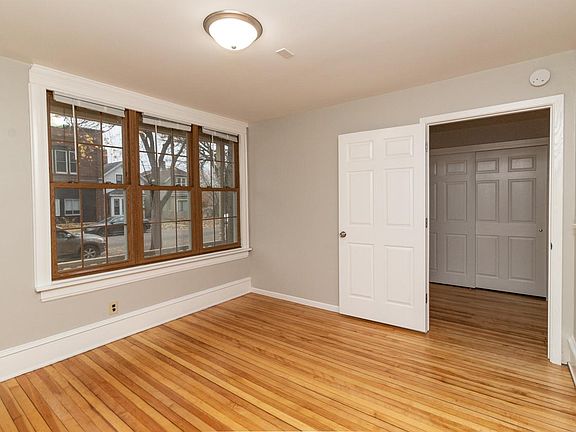 Main level bedroom, uses closet in entry