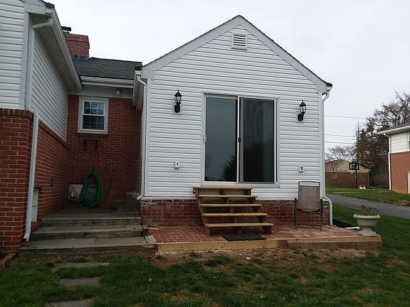 New Sunroom & Brick Patio