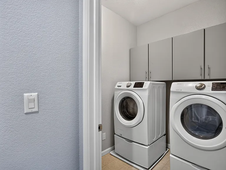 New Washer & Dryer in laundry room upstairs.