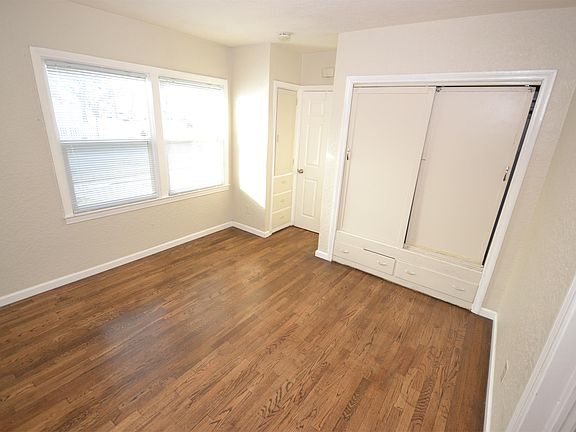 Bedroom with built in drawers.
