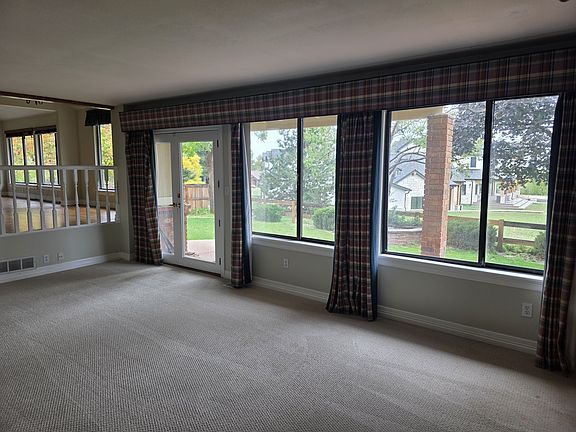 A wall of windows on the back of the home