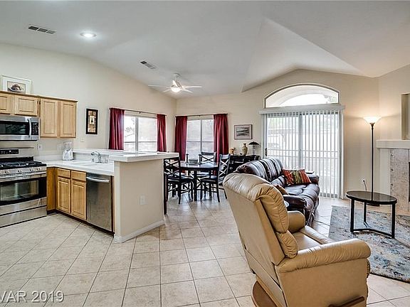BRIGHT AND LIGHT OPEN FLOOR PLAN WITH VAULTED CEILINGS, SLIDING DOOR TO COVERED PATIO.