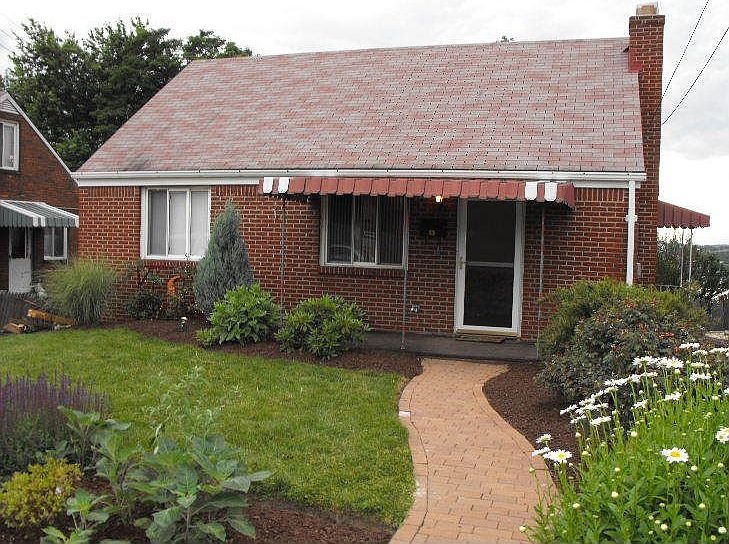 PROFESSIONALLY LANDSCAPED!