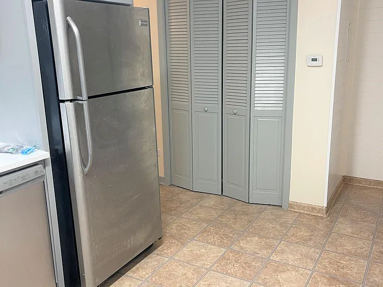 Brand New Built in Stainless Steel Refrigerator and Dishwasher.