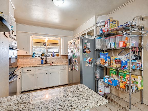 5th image of 10145 E 22nd St