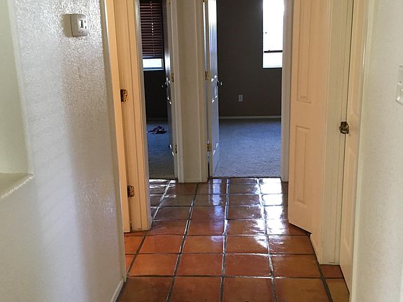 Hall to bath and 3 bedrooms