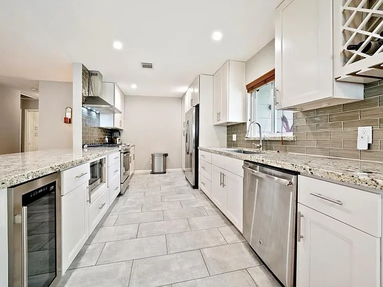 Looking into the stainless steel appliances kitchen