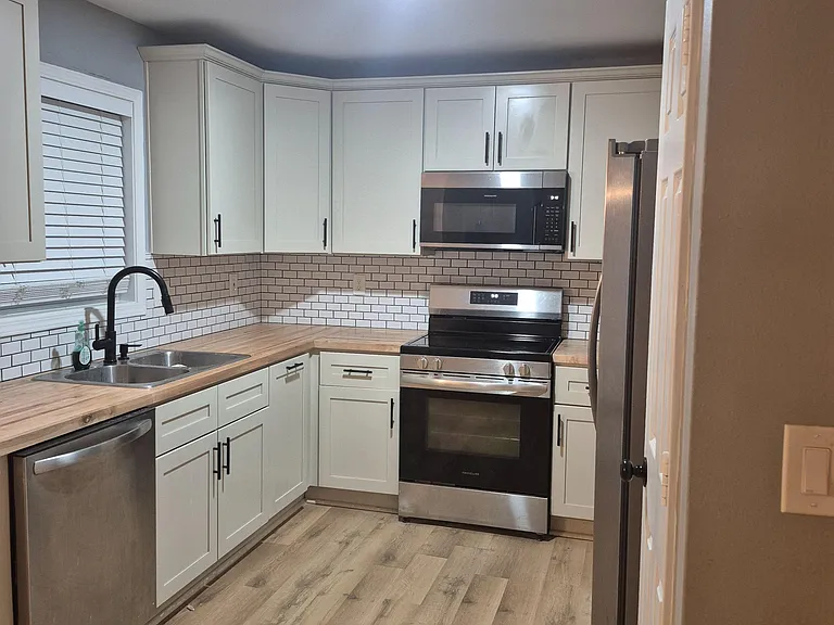 Beautiful cabinets and stainless steel appliances