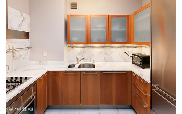 Sold by Douglas Elliman | media 18